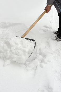 Cleaning of a snow. Clearing of road to winter time by means of a shovel