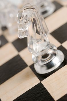 Chess. A logic board game. A material - glass