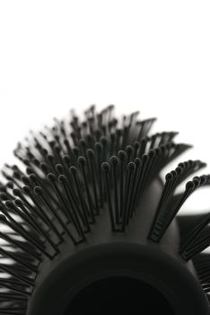 Hairbrush. The device isolated on a white background for combing