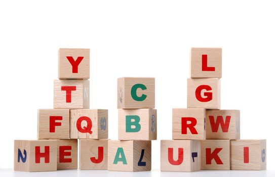 The alphabet. Letters drawn on wooden cubes. A children's toy