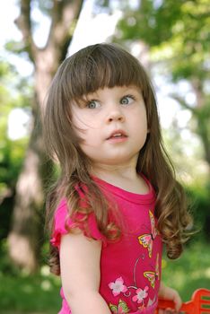 Portrait of the girl. Caucasian the child with brown eyes