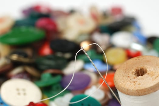Needle and a thread. A set of accessories for sewing.