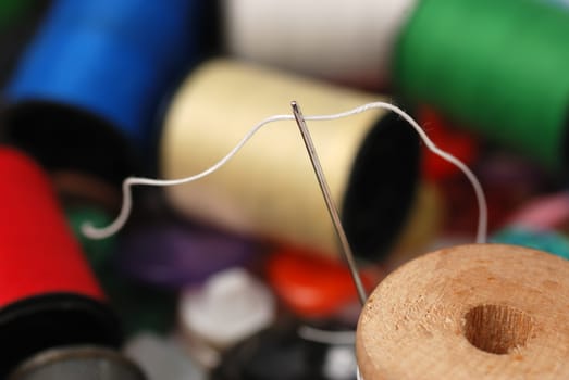 Needle and a thread. A set of accessories for sewing.