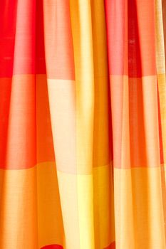 Decorated orange drapery background