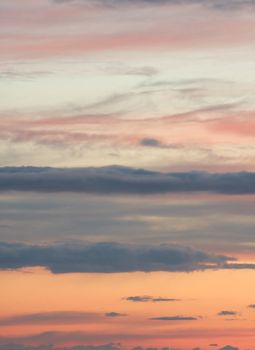 Moody crimson sky with clouds at dusk