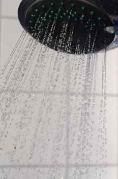 water drops falling from a shower indoors