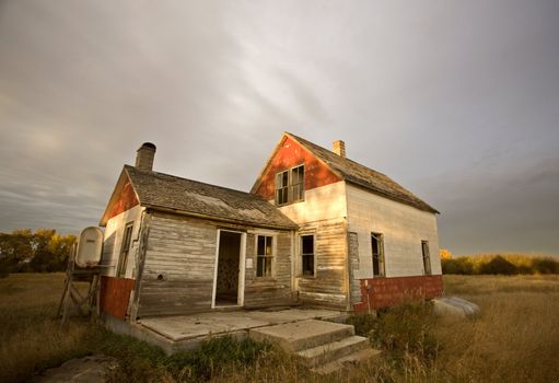Abandoned Farmhouse at sunset Saskatchewan Canada