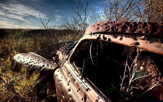 Vintage Car abandoned bullet holes target practice Saskatchewan