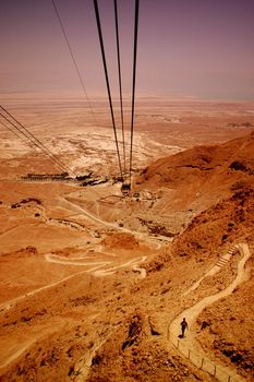Cable to Masada, Judean Desert, Israel. The Dead Sea is in the background.