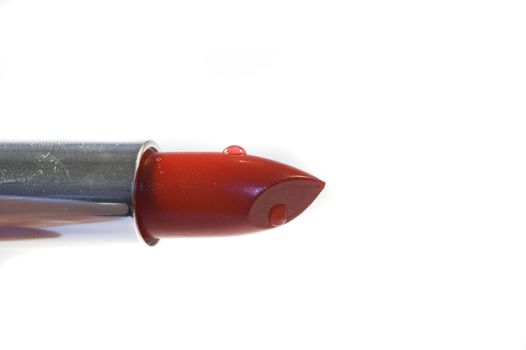 Red lipstick isolated on a white background 