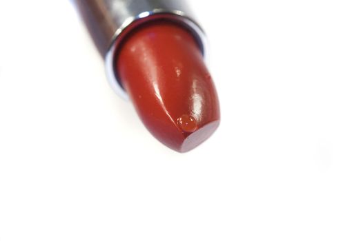 Red lipstick isolated on a white background 