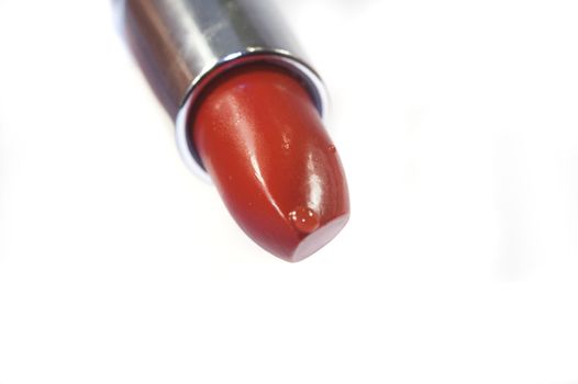 Red lipstick isolated on a white background 