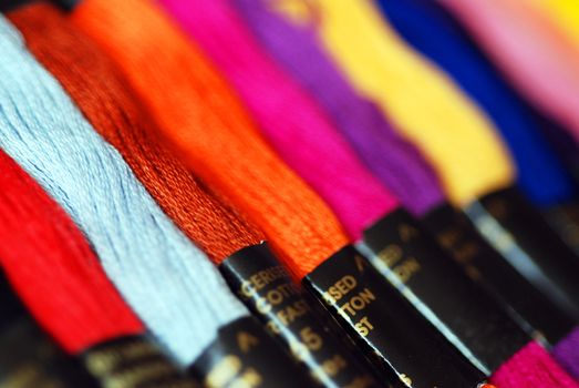 Extreme close-up of brightly coloured threads