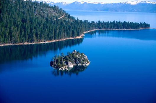 Lake Tahoe is a large freshwater lake in the Sierra Nevada mountains of the United States. It is located along the border between California and Nevada, west of Carson City, Nevada. The lake is known for the clarity of its water and the panorama of surrounding mountains on all sides.