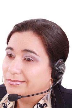 Young beautiful girl in headset,sitting at the desk tired, isolated on white background