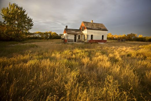 Abandoned Farmhouse at sunset Saskatchewan Canada