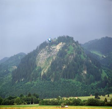 Bavarian scenery with glider and harvest