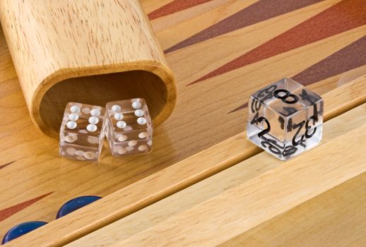 Backgammon board with roll of double sixes