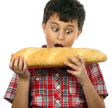 boy eating a big hamburger close up 