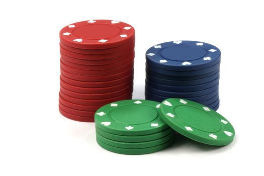 Stacked poker casino chips isolated on white background