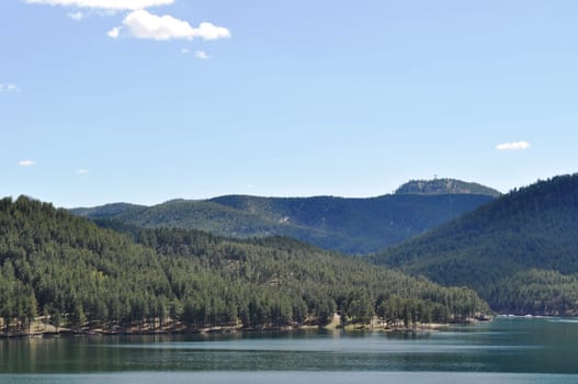 Black hills and water background