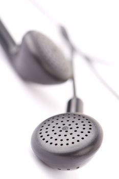 Closeup of earphones isolated on white background.