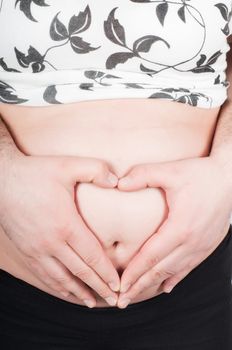 Shot of beautiful couple, pregnant woman isolated on white