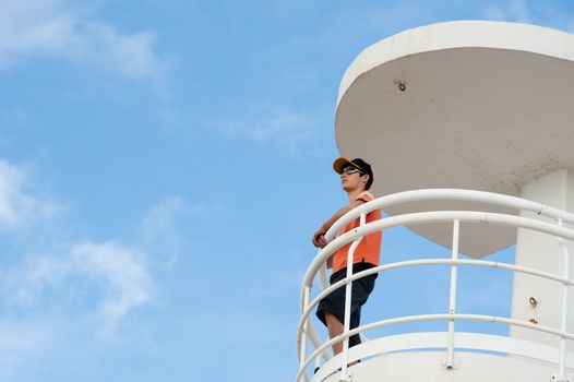 Lifeguard on duty on top of a watch-tower