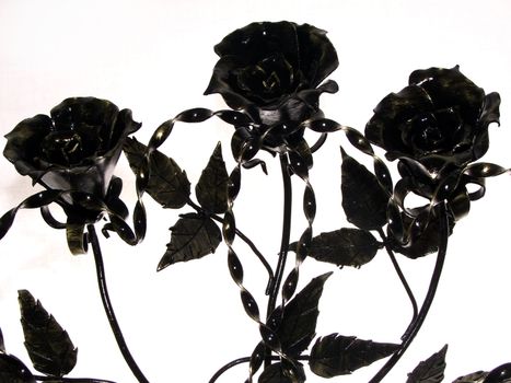 metallic candle with three roses
