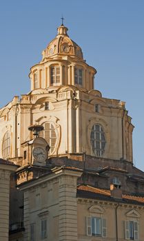 Top of a big palace in Turin, blue sky