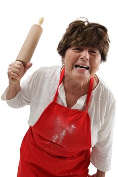 Photo of an old woman angry and threatening with a rolling pin.