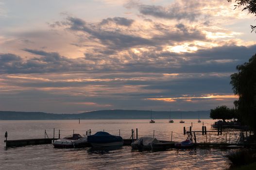 Relaxing on the seaside promenade of Obermaubach, Bodensee, Germany