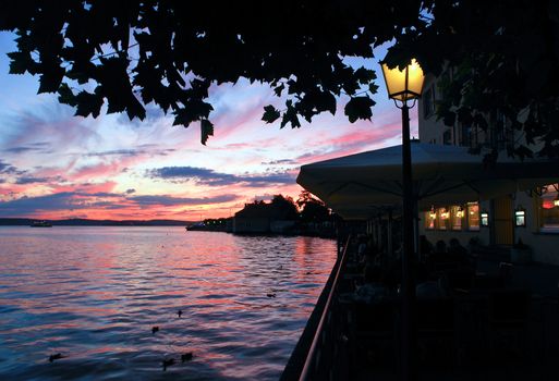 Relaxing on the seaside promenade of Meersburg, Bodensee, Germany