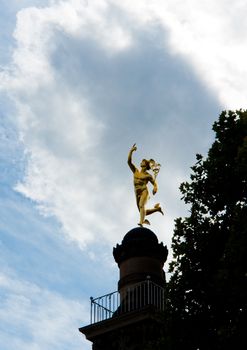 Golden Statue of Mercury messenger of the gods in Stuttgart, Baden Wuerttemberg, Germany