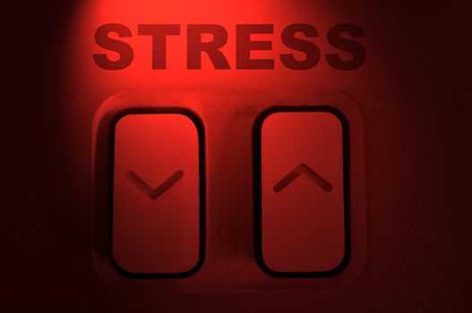 Close up of control arrow buttons with the word 'stress' highlighted with red light effect.