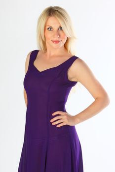 The young beautiful girl in a violet dress