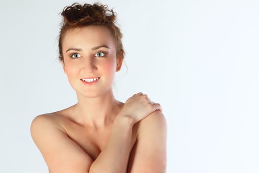 The young and beautiful girl bared on a belt