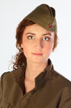The young and beautiful girl in the form of the soldier of red army