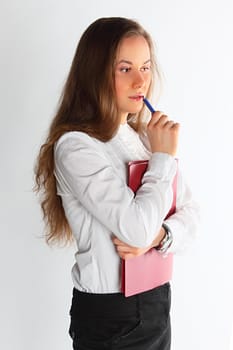 The young and beautiful girl in office clothes