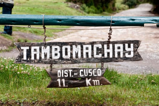 the picture of the tambomachay sign board, cusco, peru