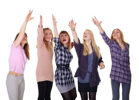 joyful girls reaching for something at the top
