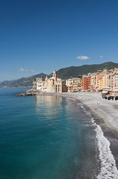 beach and promenade in Camogli, famous small town in Mediterranean sea, Italy