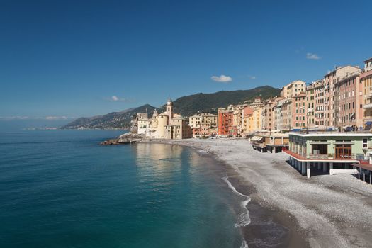 beach and promenade in Camogli, famous small town in Mediterranean sea, Italy