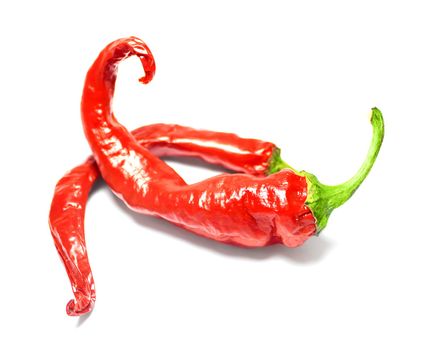 Red hot chili peppers on white background