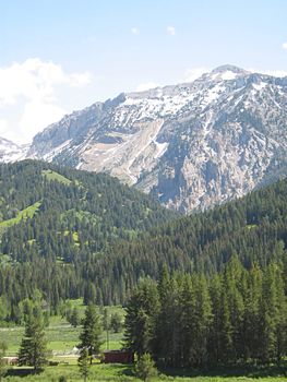 A photograph of a peaceful mountain landscape.