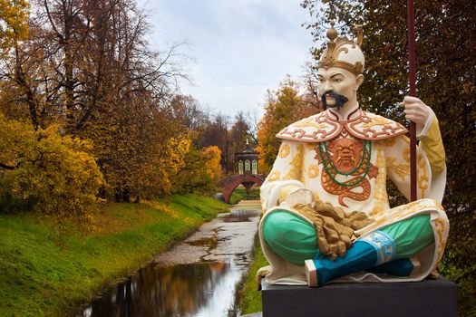 Statue on Big Chinese Bridge in Alexander`s park in Tsarskoye Selo (Pushkin) Saint-Petersburg, Russia