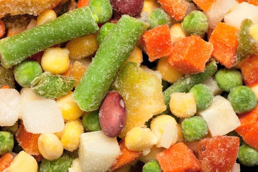 Background with colorful frozen vegetables