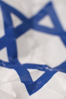 jewish blue star on israel flag, detail photo, shallow depth of view
