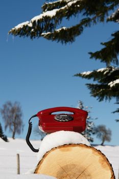 Santa Claus Hotline symbolized by a red retro phone