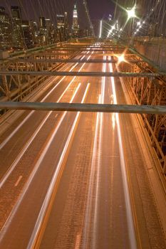 brooklyn bridge at night, car light trails